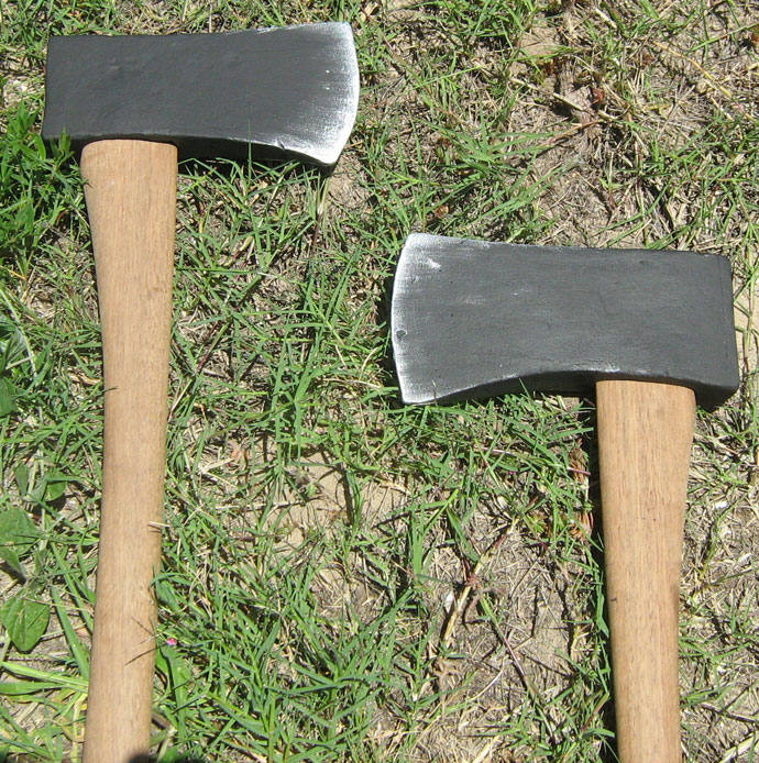 Close up on foam axehead props Close up on foam axehead props